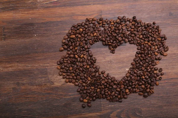 Forma Coração Feito Grãos Café Superfície Madeira — Fotografia de Stock