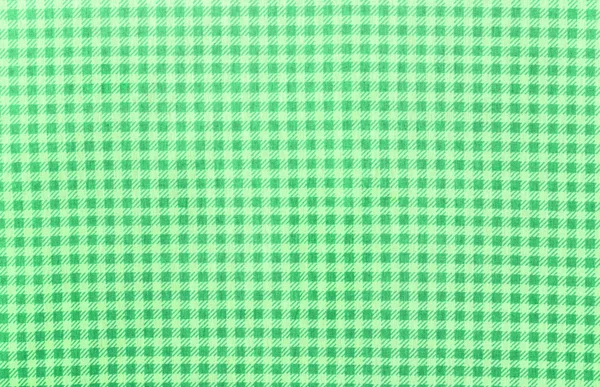 Grön textil texturerat bakgrund — Stockfoto