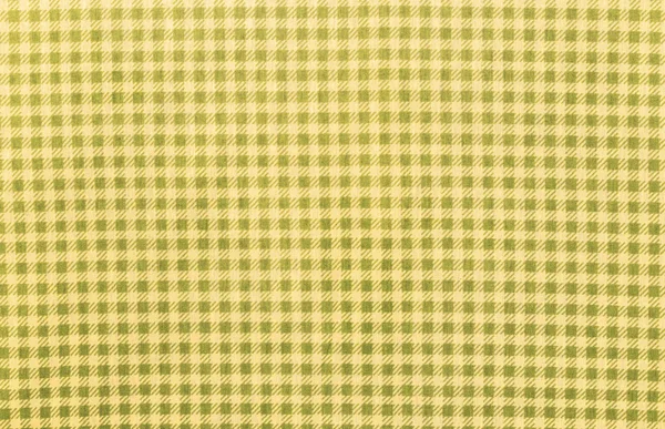 Žlutá textilní texturou pozadí — Stock fotografie