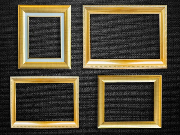 Quadro de imagem dourada sobre fundo preto — Fotografia de Stock