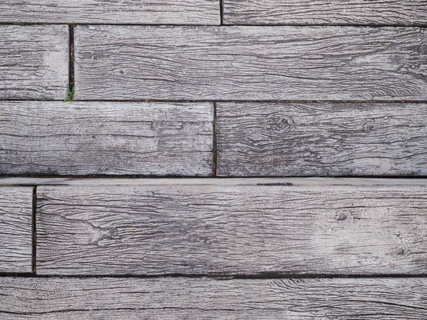 Top view of white planks wood parquet . Close up vintage flooring timber.