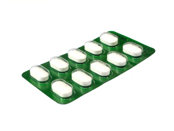 Green packed of pills in blister — Stock Photo, Image