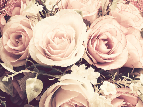 Close up bouquet of fabric rose flower with retro filter effect