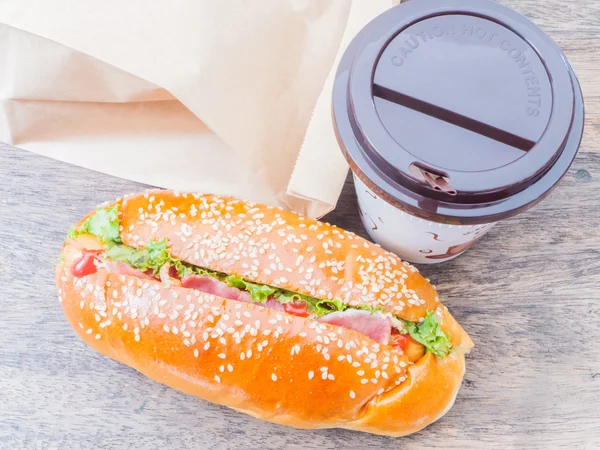 Take away coffee cup and hot dog — Stock Photo, Image