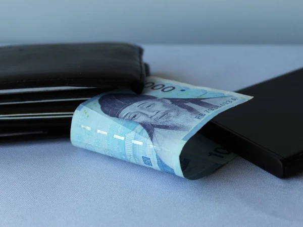 Южно Корейские Деньги Черный Кожаный Бумажник Угол Смартфона Столе — стоковое фото