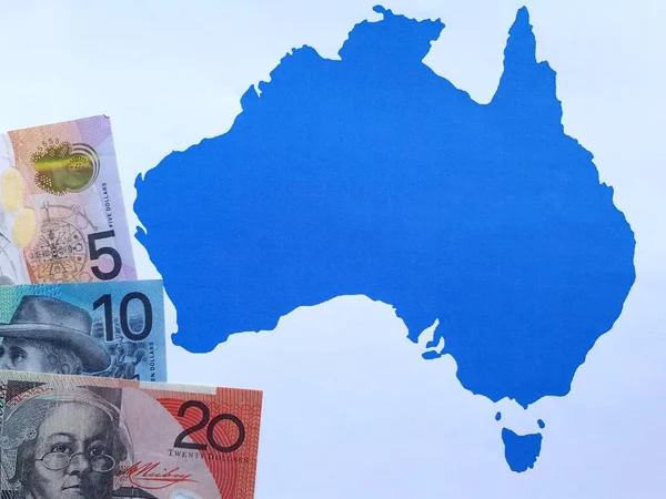 australian banknotes and background with Australia map silhouette