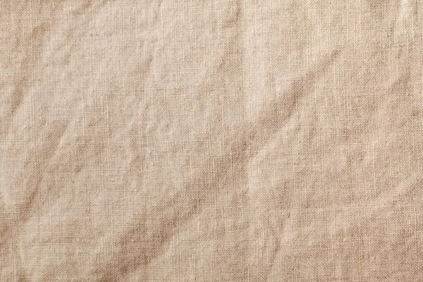 米色纺织品桌布,全框.布料质地背景。复制空间. — 图库照片