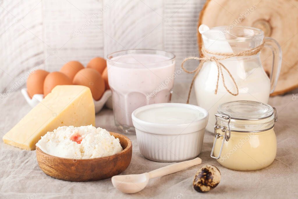 A variety of dairy products, cheese, farm eggs. The concept of the farmer's market. High quality photo