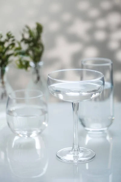 Glass glasses with fresh drinking water. Copy space.
