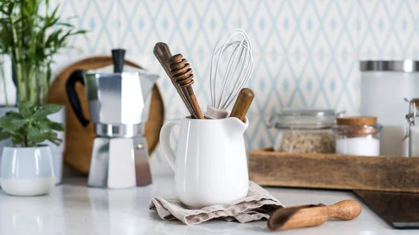 Background of kitchen utensils. Wooden objects for cooking. Copy space.