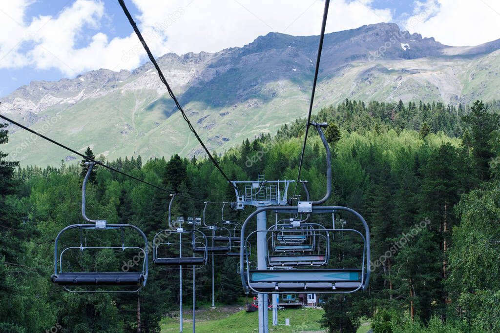 Landscape of the Caucasus Mountains with a chairlift. Arkhyz.