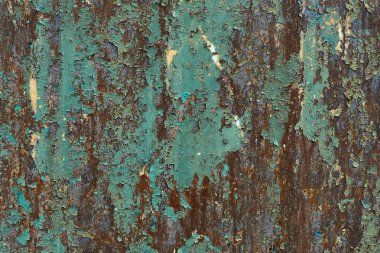 Paslı metal levha yüzeyine.