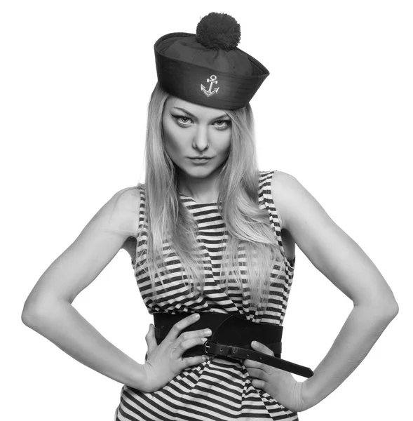 Young blond female sailor posing in her uniform and looking at the camera isolated on white background — Stock Photo, Image