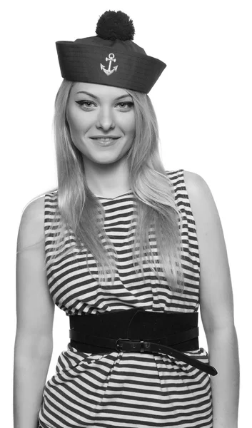 Young blond female sailor posing in her uniform and looking at the camera isolated on white background — Stock Photo, Image