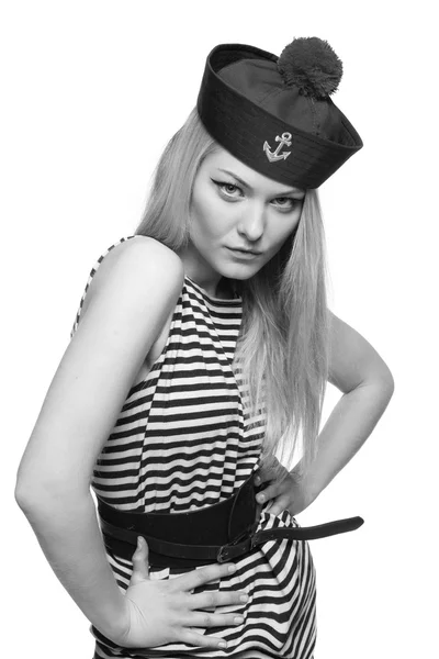 Young blond female sailor posing in her uniform and looking at the camera isolated on white background — Stock Photo, Image