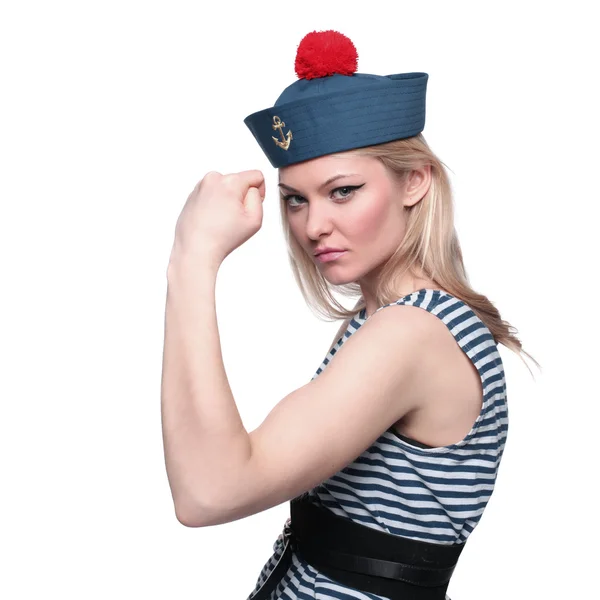 Joven marinera rubia posando en su uniforme y mirando a la cámara aislada sobre fondo blanco —  Fotos de Stock