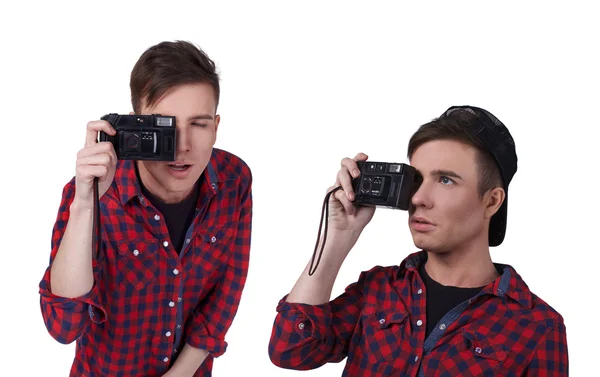 Portrait of a young attractive man with a camera — Stock Photo, Image