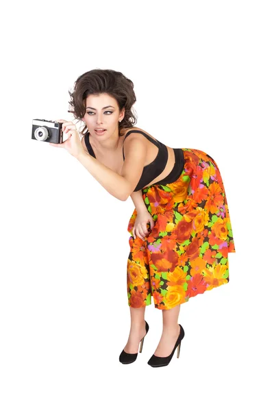 Sexy vrouw met camera geïsoleerd op witte achtergrond — Stockfoto