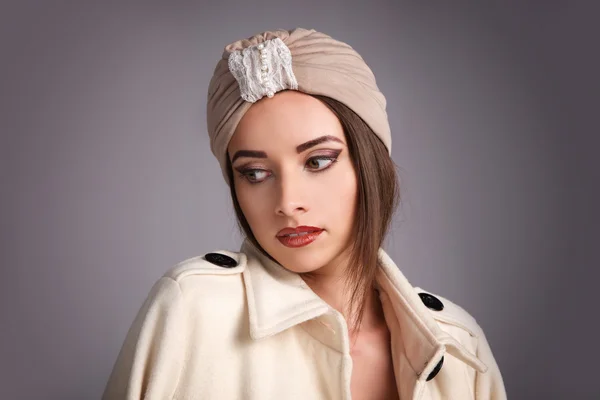 Beautiful stylish woman in oriental style in turban — Stock Photo, Image