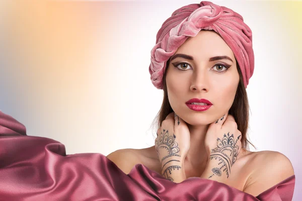 Beautiful woman in a turban — Stock Photo, Image