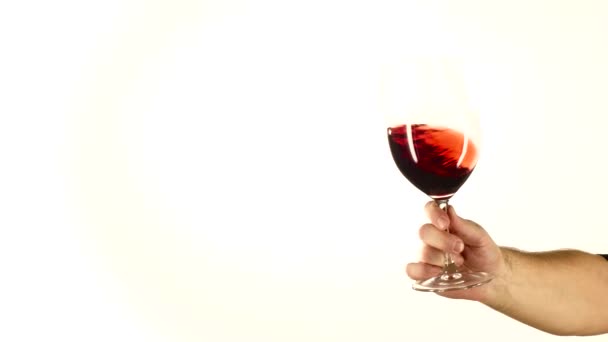 Moving red wine glass, white — Stock Video