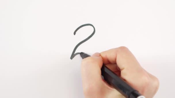 Hand of woman writing goal 2, two on paper — Stock Video