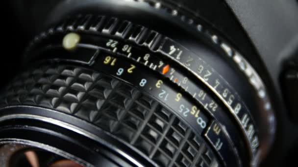 Wheel on camera aperture, close up — Stock Video