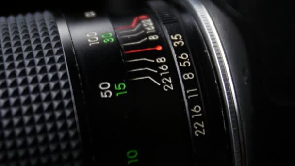 Wheel on camera aperture, distance, up view, close up — 图库视频影像