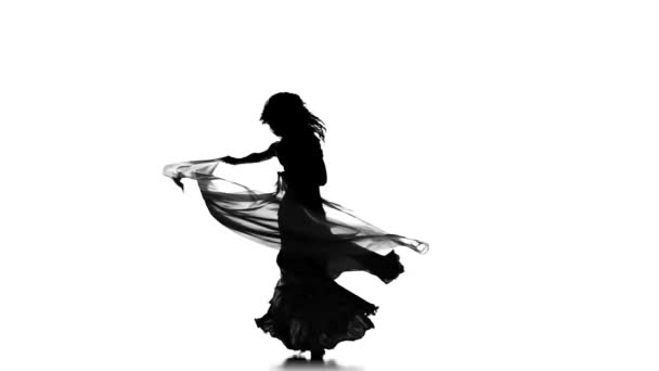 Pretty young woman go on dancing belly dance with shawl, sihouette, white, slow motion — Stock videók