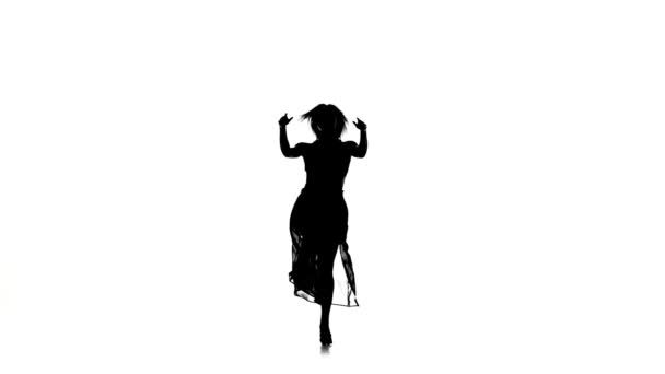 Beautiful woman go on dance modern contemporary style on white, silhouette, slow motion — Stok video