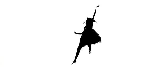 Graceful girl dancer dancing contemporary dance, jumps on white, silhouette, slow motion — Wideo stockowe