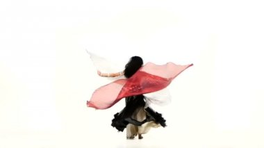 Young exotic belly dancer with two wings, in unusual suit dance, on white, slow motion