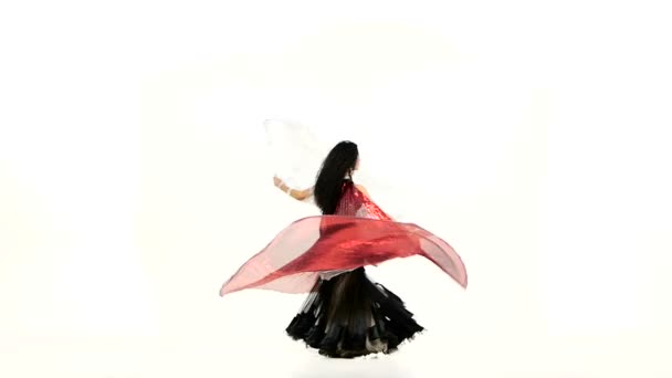 Beautiful exotic belly dancer with two wings, in unusual suit dance, on white, slow motion — Stock Video