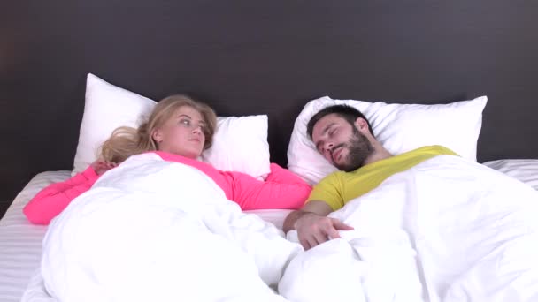 Young couple waking up fully rested — Stock Video