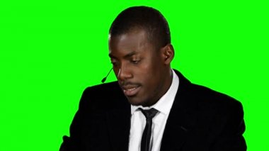 Call centre worker. Green screen