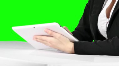 Using laptop. Green screen
