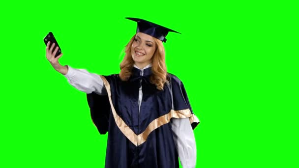 Graduate take self portrait. Green screen — Stock Video