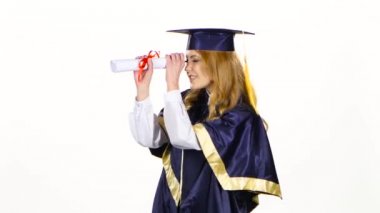 Woman with graduation gown and diplom. White