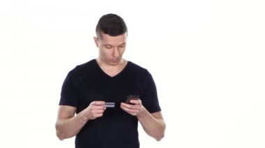 Bir sürü kredi kartı ve online alışveriş için bir telefon. Beyaz