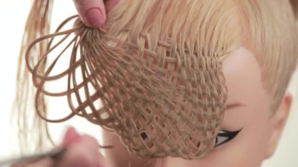 Formation of bulk weaving of the strands. Weave hairstyles. White. Close up — Stock Video