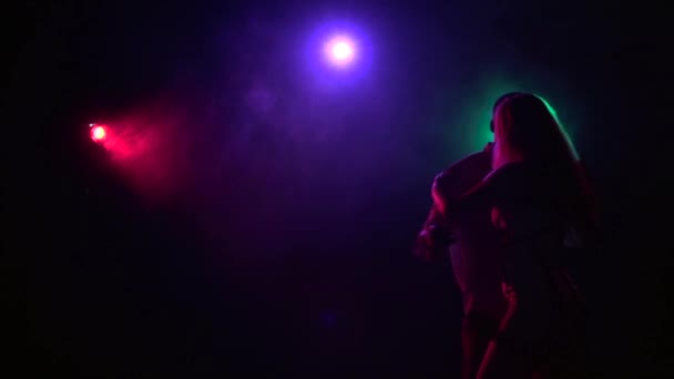 Close-up couple dancing in pair at disco style. Slow motion — Stock Video