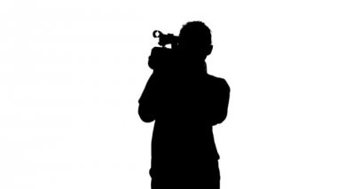 Profesyonel bir kamera stüdyo fotoğrafçılığı. Beyaz. Siluet