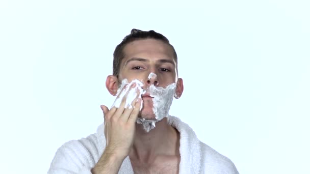 Guy applying shaving foam. White background. Slow motion — Stock Video