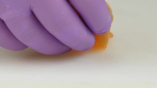 People puts slices of red fish to the surface. Close up — Stock Footage People puts slices of red fish to the surface. Close up Stock Video