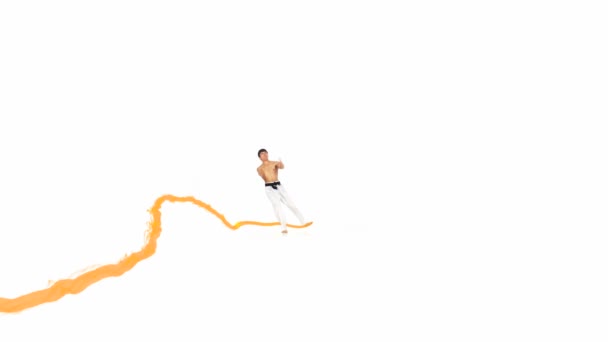 Karate man with a fier line. White background — Stock Video