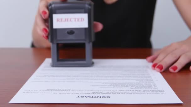 Woman puts print stamp on document. Close up — Wideo stockowe