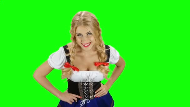 Girl in bavarian costume seductive beckoning by finger to herself. Green screen — Stock Video