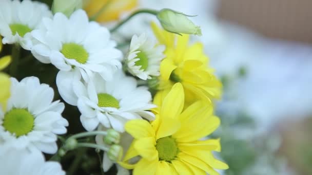 Bouquet of flowers on table — Stock Video