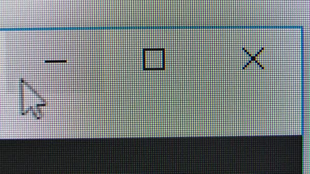 Макросъемка экрана компьютера, на котором перемещается курсор. Нажмите на кнопку закрытия. Супер-макропиксели. — стоковое видео