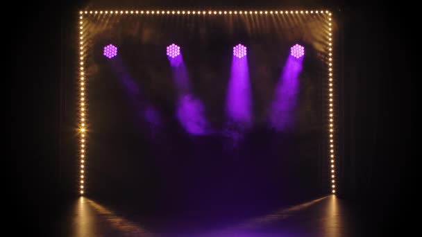 Stage purple and yellow lights shining at studio. Lighting equipment. Lighting effects. The concept of a holiday, show or theatrical performance. — Stock Video